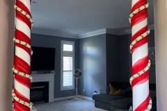 Pillar Decor With Red Drapes & Flower String